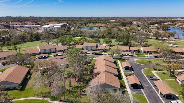 aerial view featuring a residential view and a water view