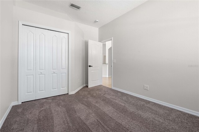 11611 Jordans Landing Ct, Riverview, FL 33569 - unfurnished bedroom with carpet floors, baseboards, and a closet