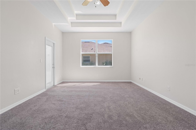 11611 Jordans Landing Ct, Riverview, FL 33569 - empty room with a tray ceiling, carpet, a ceiling fan, and baseboards