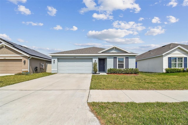 ranch-style home featuring stucco siding, an attached garage, concrete driveway, and a front yard