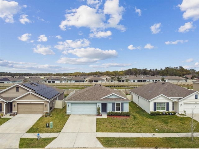 8034 Broad Pointe Dr, Zephyrhills, FL 33540 - view of front facade with a residential view, concrete driveway, and an attached garage