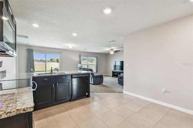 8034 Broad Pointe Dr, Zephyrhills, FL 33540 - kitchen with dishwasher, ceiling fan, open floor plan, a peninsula, and light stone countertops
