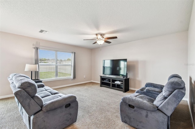 8034 Broad Pointe Dr, Zephyrhills, FL 33540 - carpeted living room with a ceiling fan and a textured ceiling