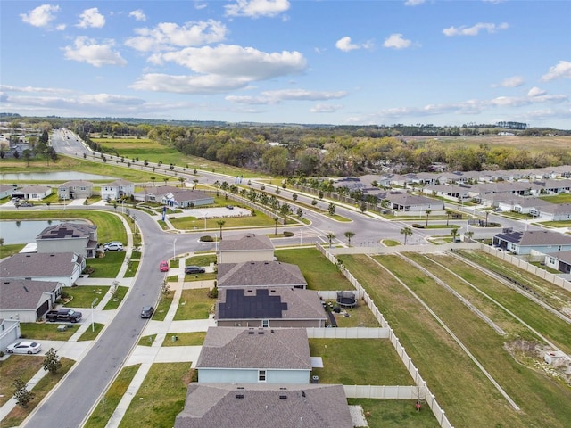 8034 Broad Pointe Dr, Zephyrhills, FL 33540 - aerial overview of property's location featuring a large body of water and nearby suburban area