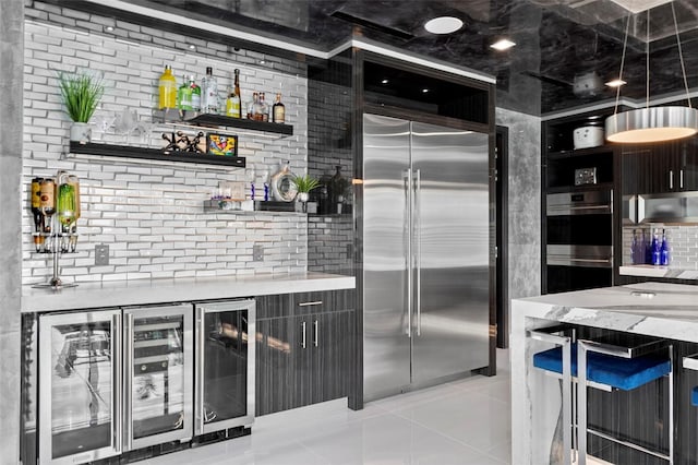 interior space featuring stainless steel appliances, a dry bar, wine cooler, and light tile patterned flooring