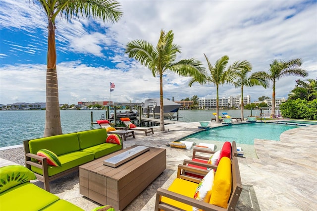 outdoor pool featuring a boat dock, boat lift, an outdoor hangout area, a water view, and a patio area