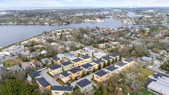 birds eye view of property featuring a water view and a residential view