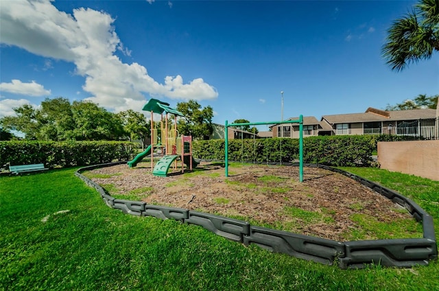 community play area with a yard