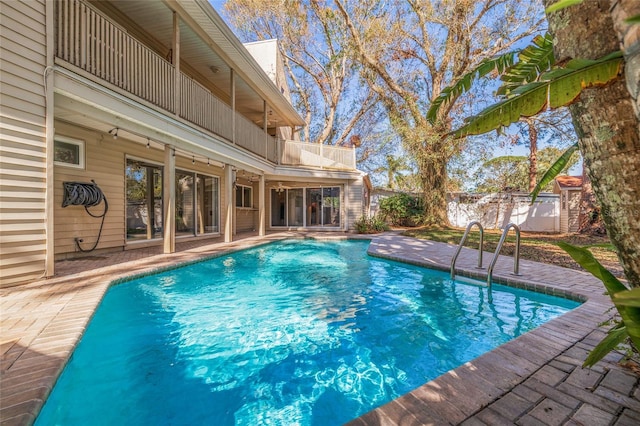 view of pool featuring fence and a fenced in pool