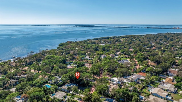 bird's eye view featuring a water view and a residential view