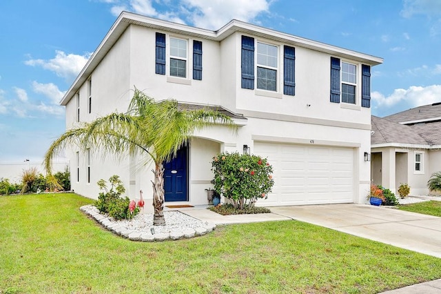 view of front of house with a front yard, concrete driveway, an attached garage, and stucco siding