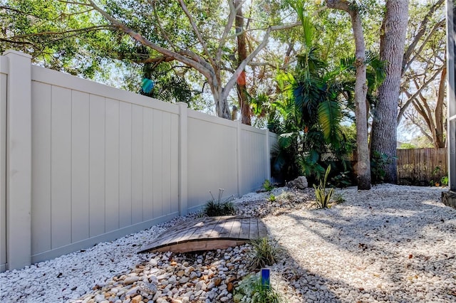 view of yard featuring a fenced backyard