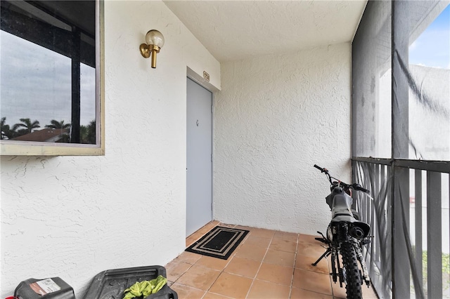 doorway to property with stucco siding