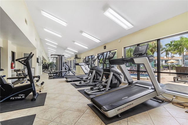 exercise room featuring tile patterned flooring and visible vents