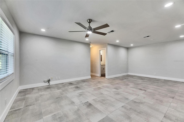 unfurnished room with baseboards, recessed lighting, visible vents, and a ceiling fan