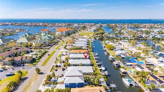 aerial view featuring a water view and a residential view