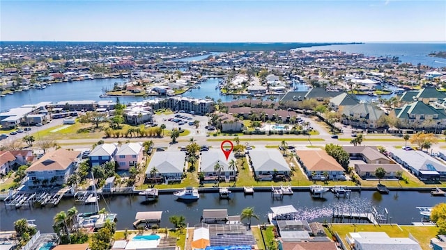 aerial view featuring a residential view and a water view