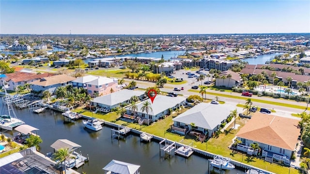 aerial view with a water view and a residential view