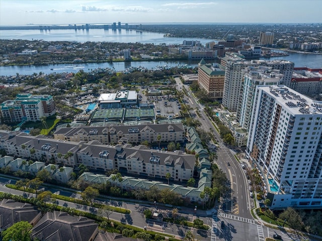 bird's eye view featuring a water view and a city view