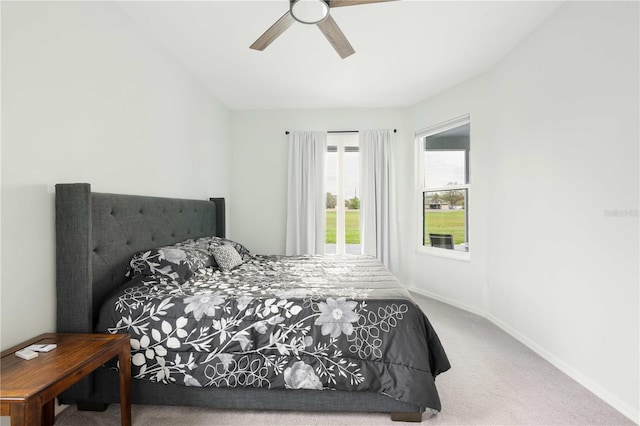 bedroom with carpet, ceiling fan, and baseboards