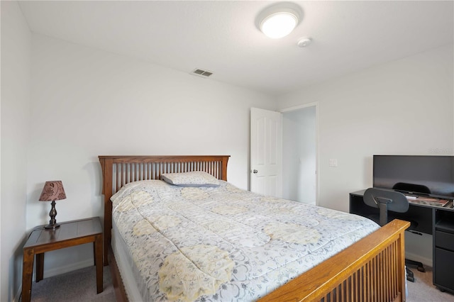 bedroom with carpet flooring and visible vents