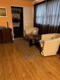 bedroom with wood finished floors