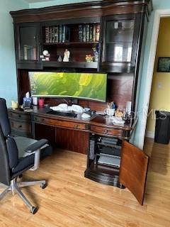 bar with light wood finished floors