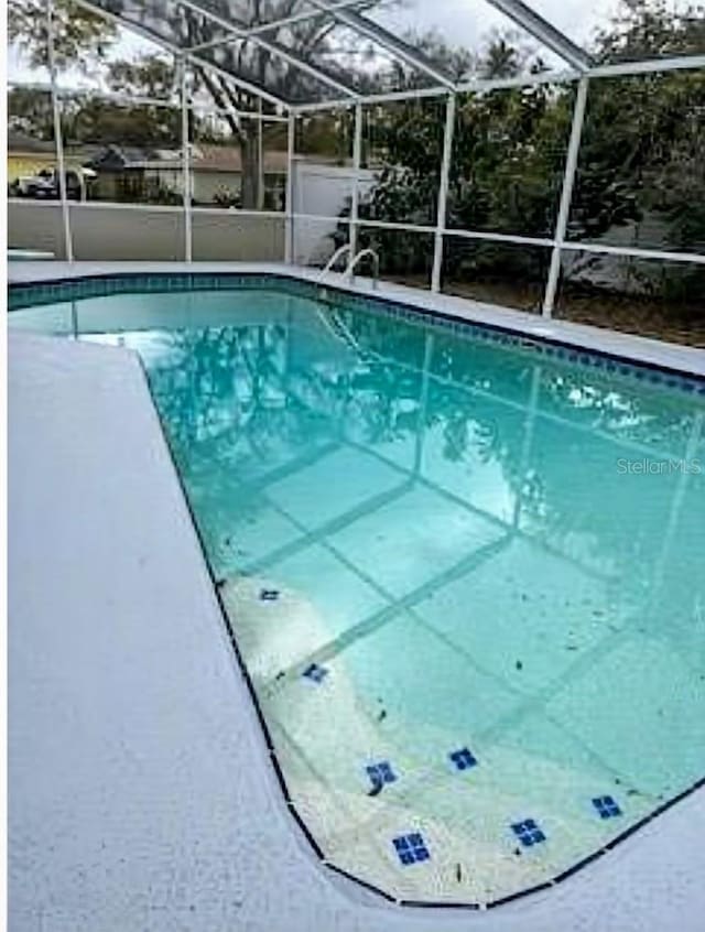2510 Cypress Bend Dr E, Clearwater, FL 33761 - swimming pool with a lanai and a patio area