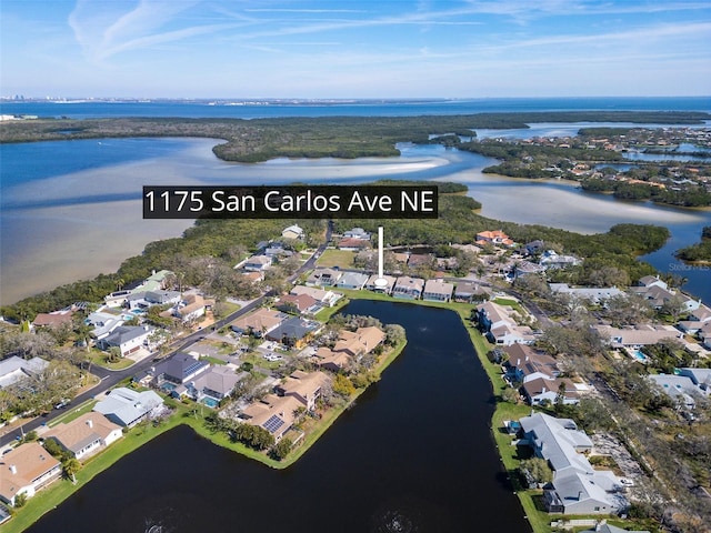 aerial view featuring a water view and a residential view