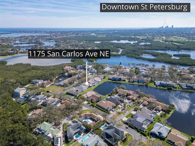 bird's eye view featuring a residential view and a water view