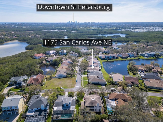 aerial view with a residential view and a water view