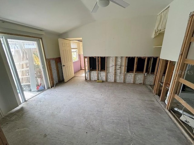 interior space featuring vaulted ceiling and a ceiling fan