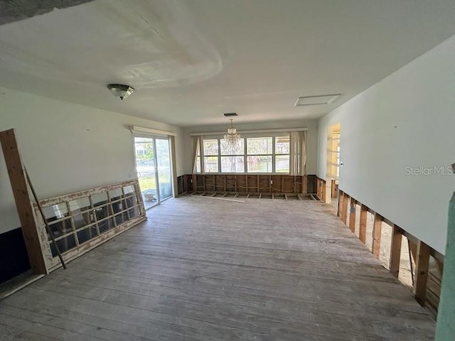 unfurnished living room featuring wood finished floors