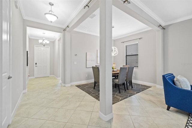 dining area with visible vents, crown molding, baseboards, and light tile patterned floors