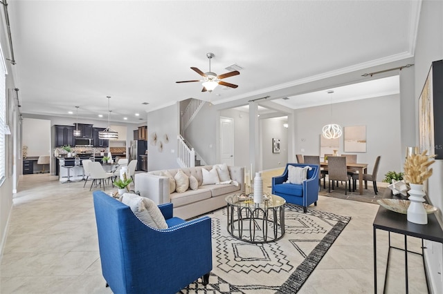 living room featuring crown molding, stairway, and baseboards