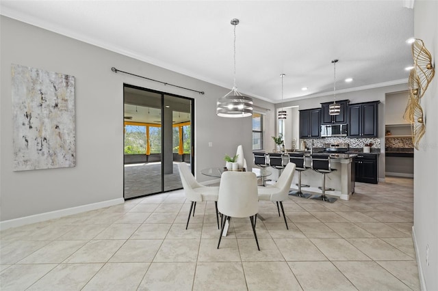 dining room with light tile patterned floors, baseboards, crown molding, and recessed lighting