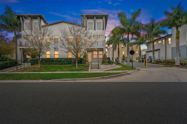 view of front of home with concrete driveway