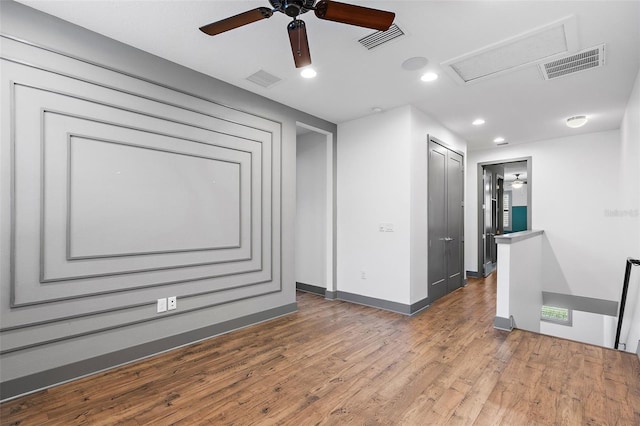 1110 25th St N, Saint Petersburg, FL 33713 - spare room featuring baseboards, wood finished floors, visible vents, and recessed lighting