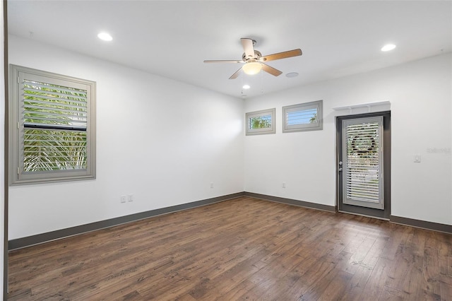 1110 25th St N, Saint Petersburg, FL 33713 - unfurnished room with ceiling fan, baseboards, dark wood-type flooring, and recessed lighting