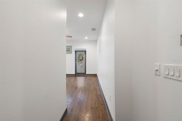 1110 25th St N, Saint Petersburg, FL 33713 - hallway featuring baseboards, visible vents, dark wood-style flooring, and recessed lighting