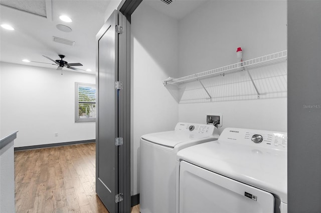 1110 25th St N, Saint Petersburg, FL 33713 - laundry room featuring laundry area, visible vents, wood finished floors, independent washer and dryer, and recessed lighting