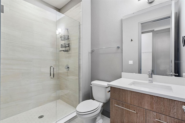 1110 25th St N, Saint Petersburg, FL 33713 - bathroom with toilet, a shower stall, and vanity