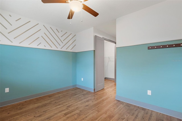 1110 25th St N, Saint Petersburg, FL 33713 - additional living space with ceiling fan, baseboards, and light wood-style floors