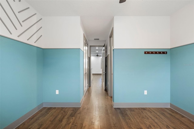 1110 25th St N, Saint Petersburg, FL 33713 - hallway featuring dark wood-type flooring, visible vents, and baseboards