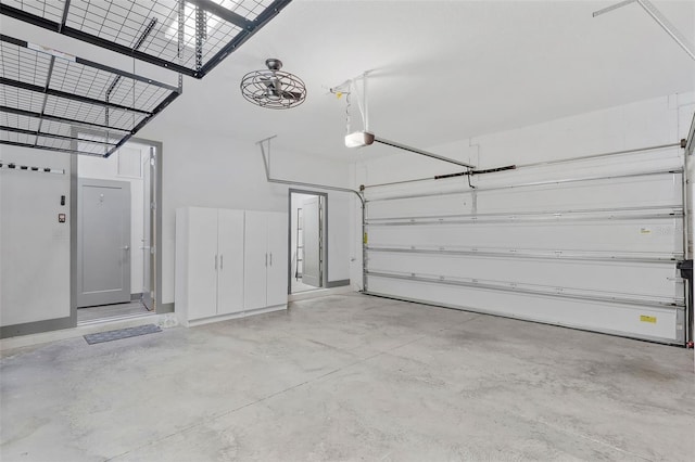1110 25th St N, Saint Petersburg, FL 33713 - garage featuring a garage door opener