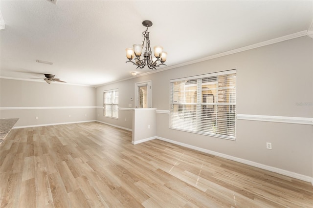 unfurnished room with light wood finished floors, ceiling fan with notable chandelier, baseboards, and ornamental molding