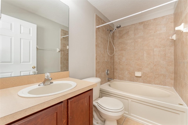 bathroom with a textured ceiling, toilet, vanity, shower / bathing tub combination, and tile patterned floors