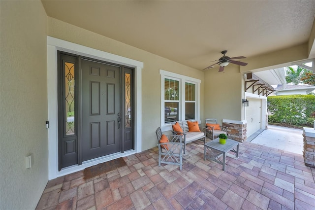 view of patio / terrace with a ceiling fan and covered porch