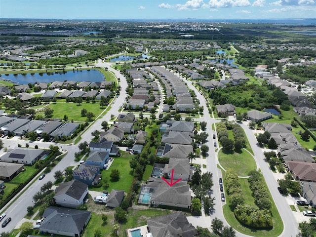 aerial view featuring a water view and a residential view