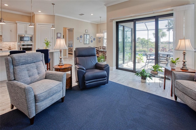 sitting room featuring visible vents, recessed lighting, light wood-style flooring, and crown molding